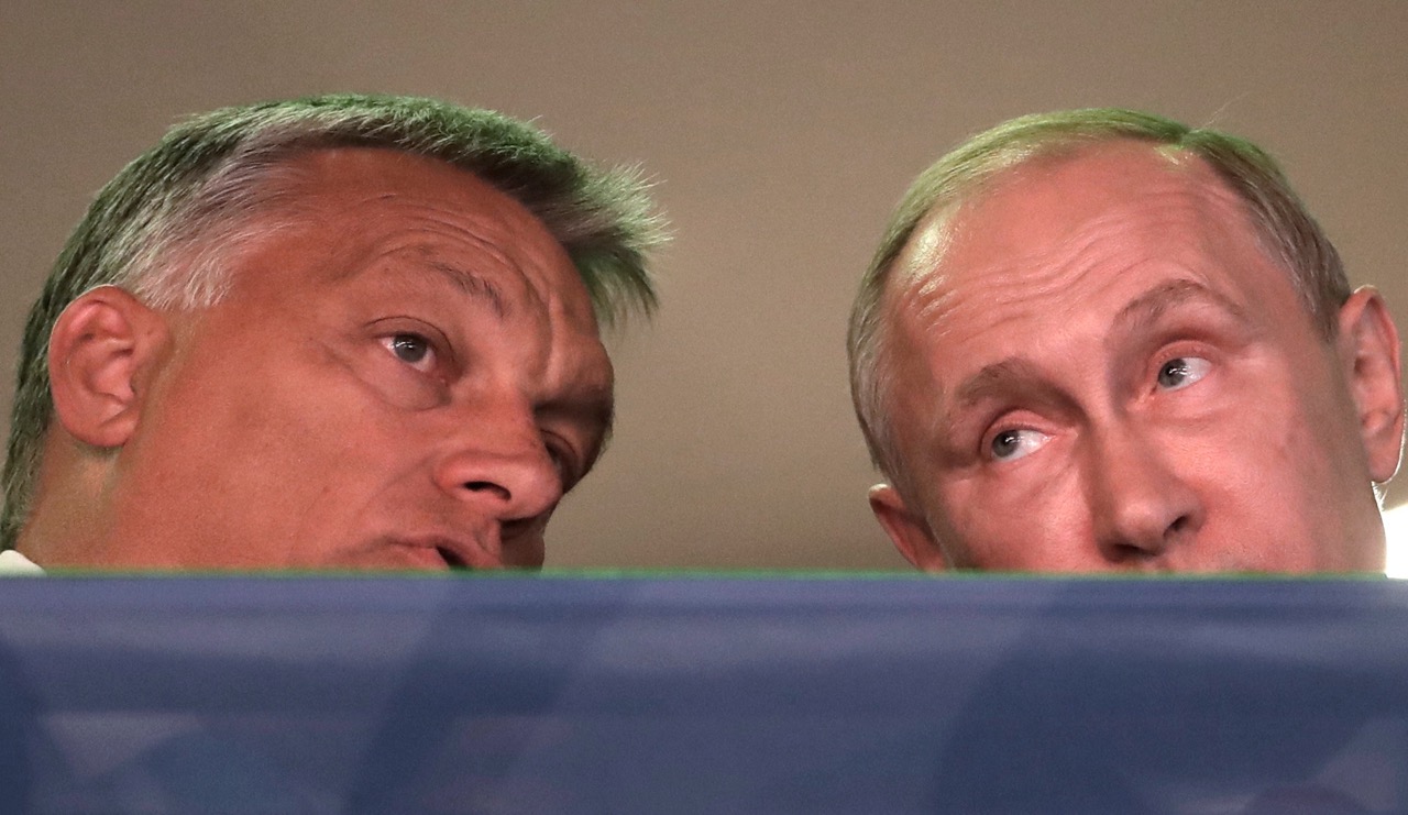 Russian President Vladimir Putin, right, talks to Hungarian Prime Minister Viktor Orban, left, after arriving at the Judo World Championships in Budapest, Hungary, 28 August 2017