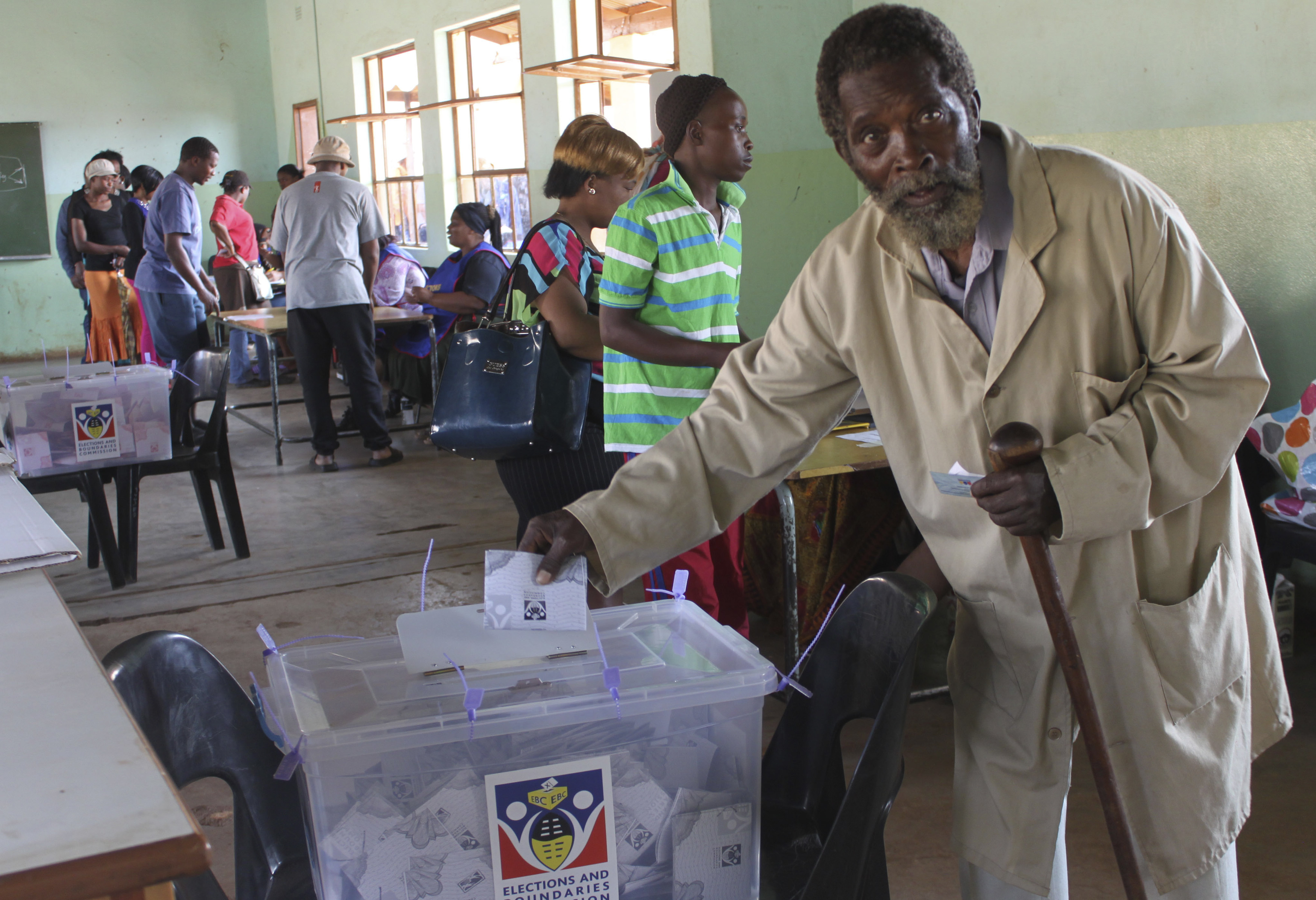 A voter casts his ballot at a voting station in Nhlangano, Swaziland, on 20 September 2013.