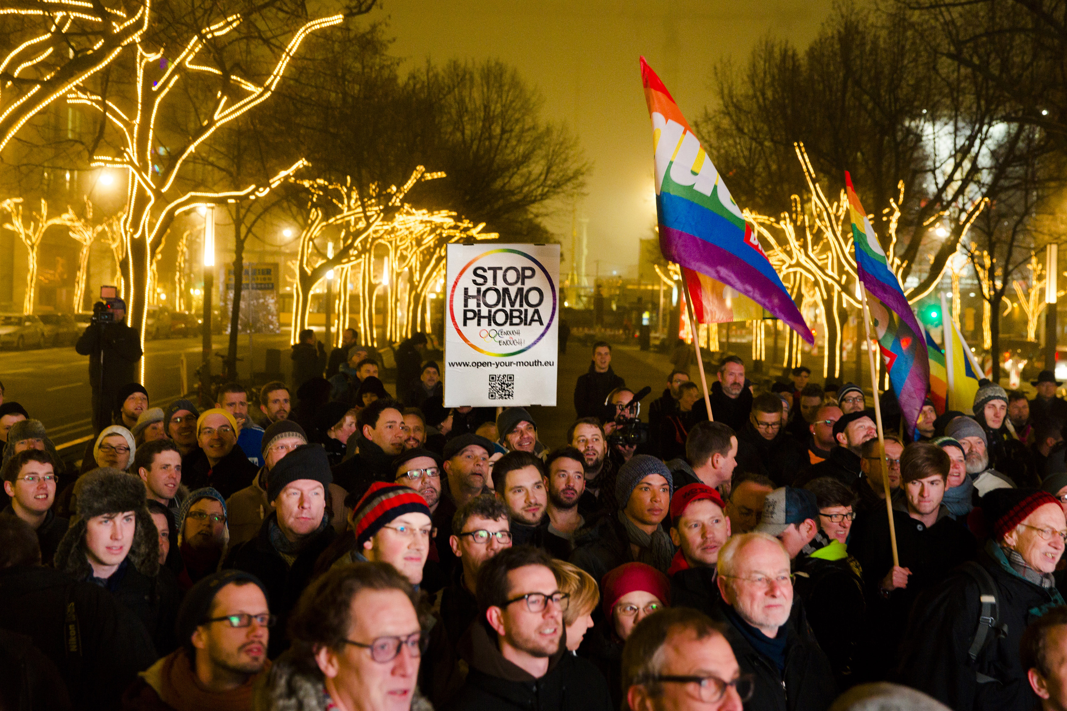 12 December 2013, Germany. Protestors call on the Russian authorities to lift anti-LGBT laws outside the Russian embassy in Berlin.