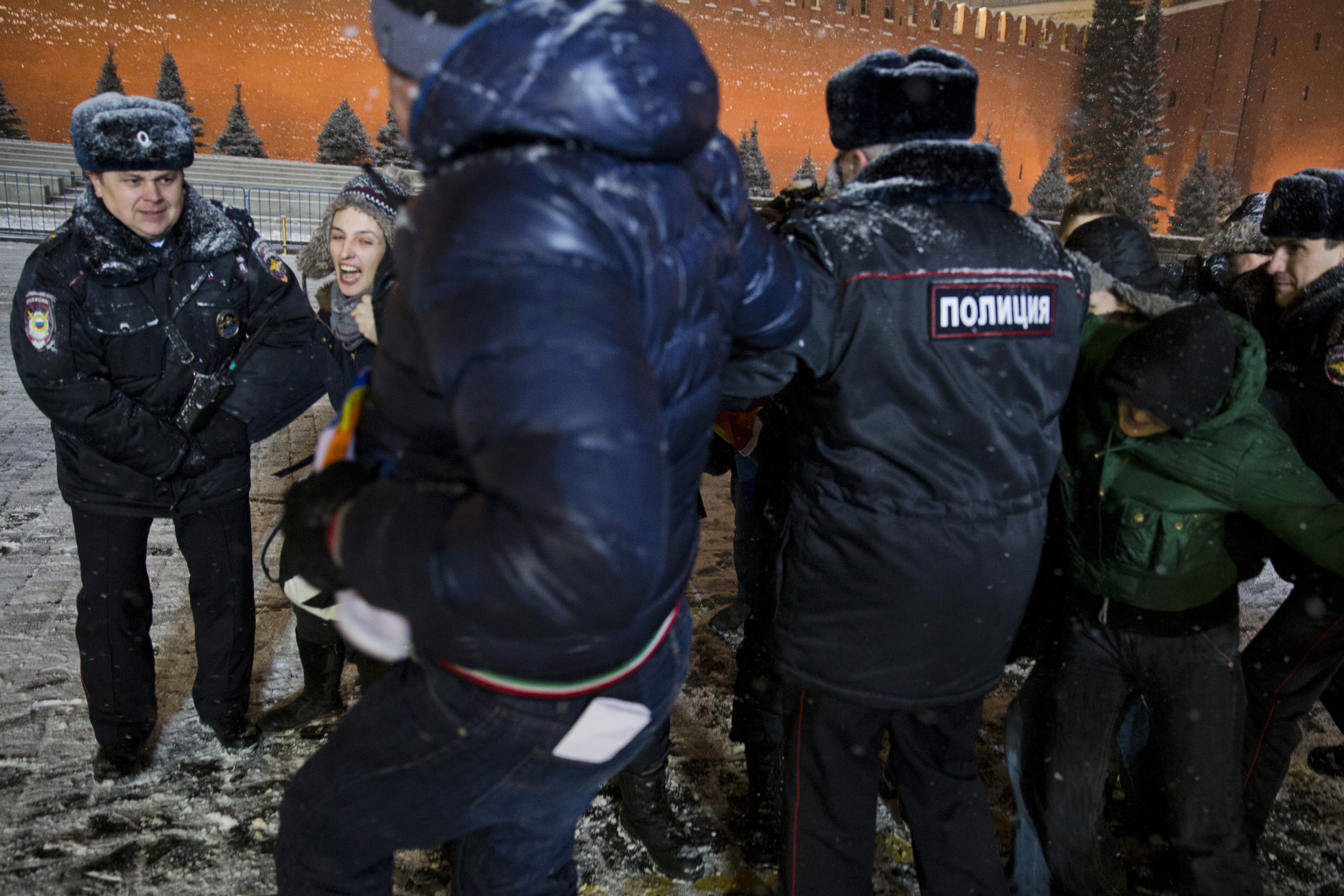7 February 2014, Russia. Interior Ministry members detain LGBT rights activists attempting to hold a protest rally in Red Square near the Kremlin in Moscow shortly before Vladimir Putin opened the Sochi Winter Olympics. Media reported that 10 protesters were detained in Moscow and four in St. Petersburg.