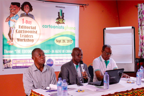 The Executive Director of Cartoonists Ghana, Ike Essel (middle), delivers a welcome message at a workshop held in Accra on 26 September 2017