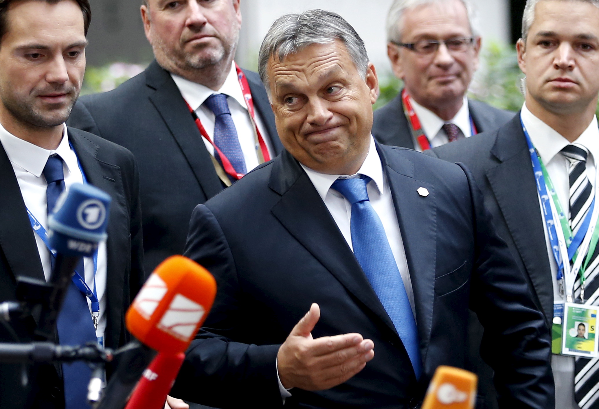 Hungary's Prime Minister Viktor Orban reacts as he arrives at a European Union leaders extraordinary summit on the migrant crisis, in Brussels, 23 September 2015