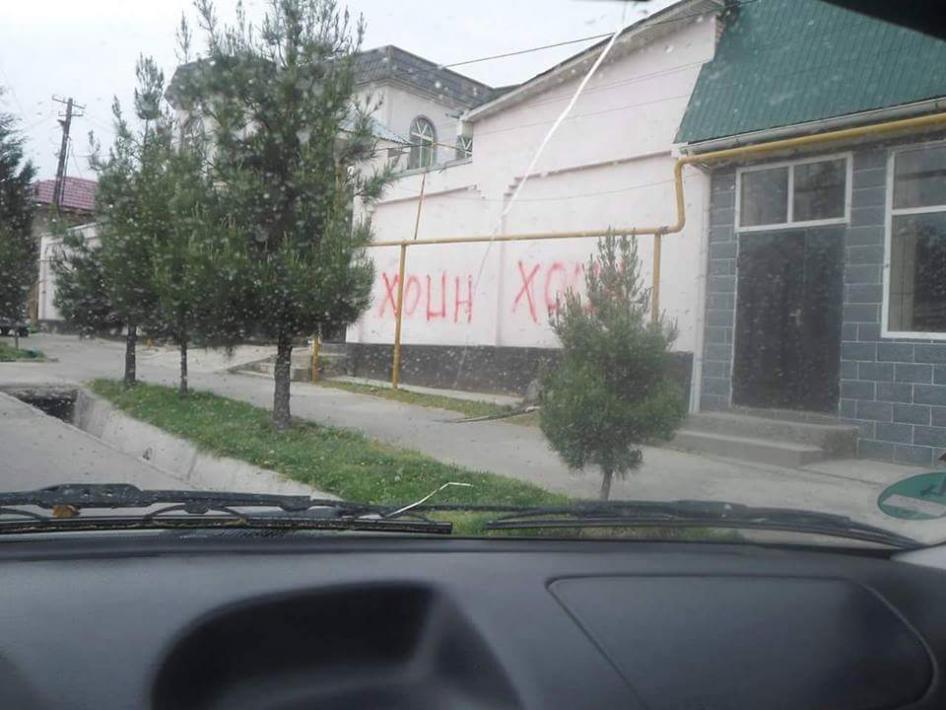 The word “traitor” spray-painted on the walls of Valiev’s family home. 