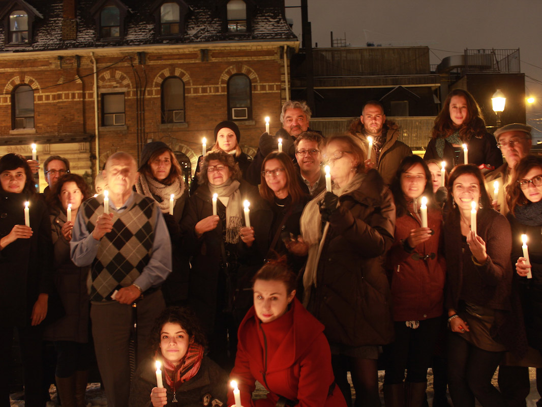 Staff of the IFEX Secretariat gather in Toronto, Canada on the 5th anniversary of the massacre, November 2014